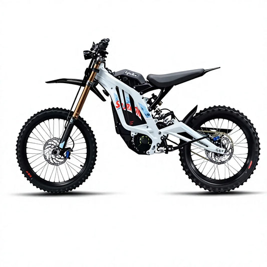 A white and black electric dirt bike with knobby tires, a black seat, and gold front suspension forks, shown from a side profile on a white background.