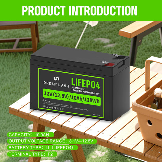 A DreamDash LIFEPO4 12V rechargeable lithium-ion prolate battery displayed on a wooden picnic table outdoors on grass, with a green 'PRODUCT INTRODUCTION' banner at the top and feature text overlays at the bottom.