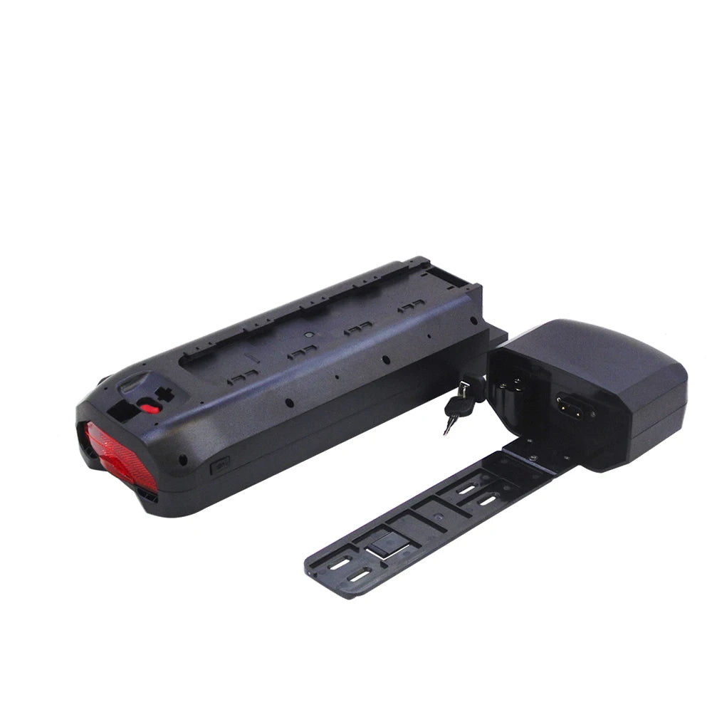 A black plastic battery or power pack accessory with a red accent on one end, shown alongside mounting brackets and a small key on a plain white background.