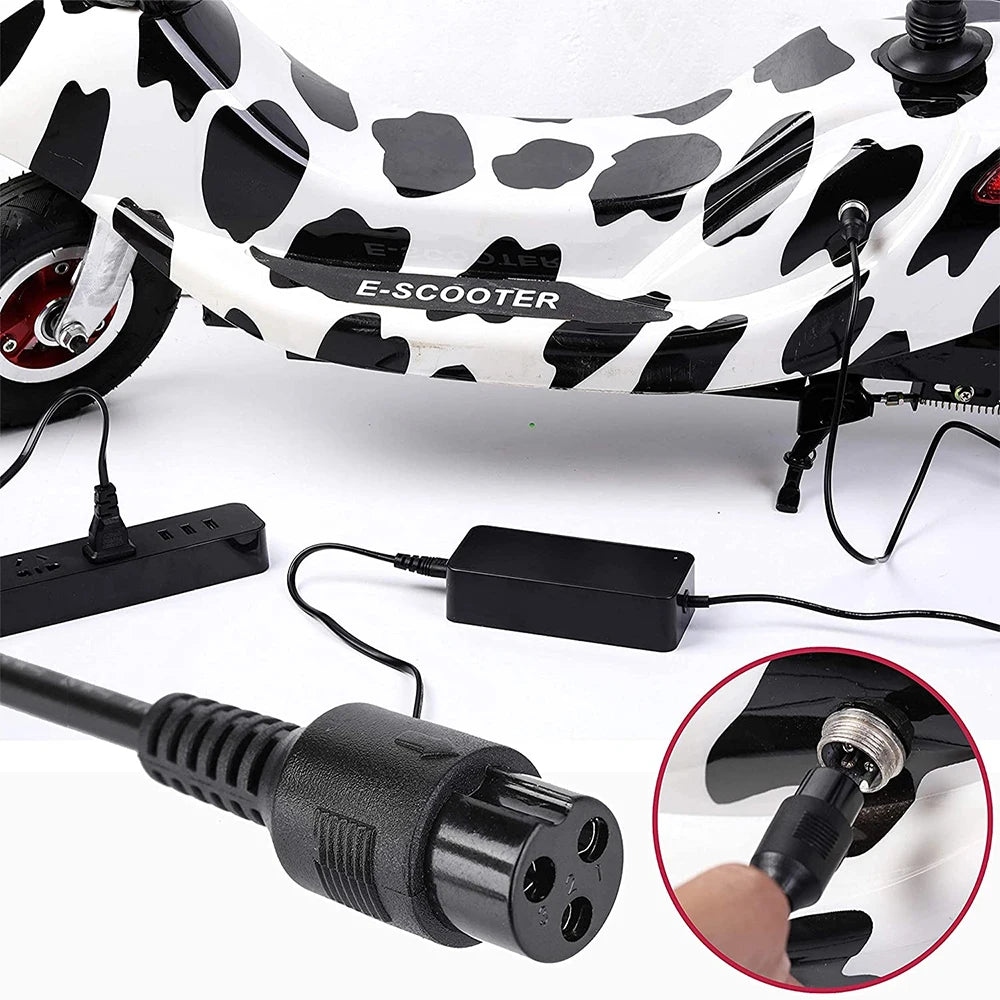 A white and black cow-print electric scooter with a black power adapter, power strip, and charging cable shown on a white background, plus a circular inset demonstrating the charging port connection.