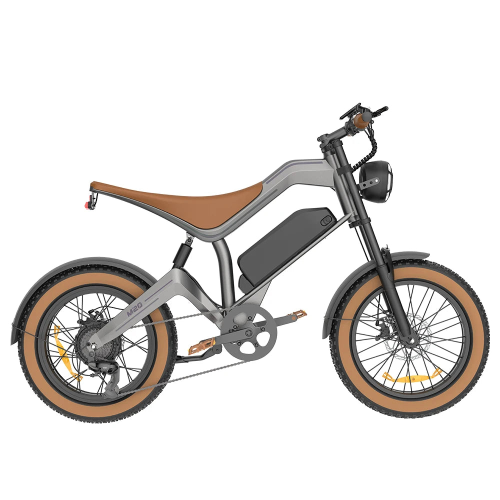 A modern electric bicycle with a matte gray frame, a brown leather saddle, brown sidewall tires, and a black front fork and headlight, shown from a side profile on a white background.