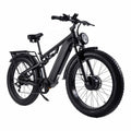 A matte black electric fat tire bicycle with a front headlight, rear rack, and fenders, shown from a three-quarters front angle on a solid white background.