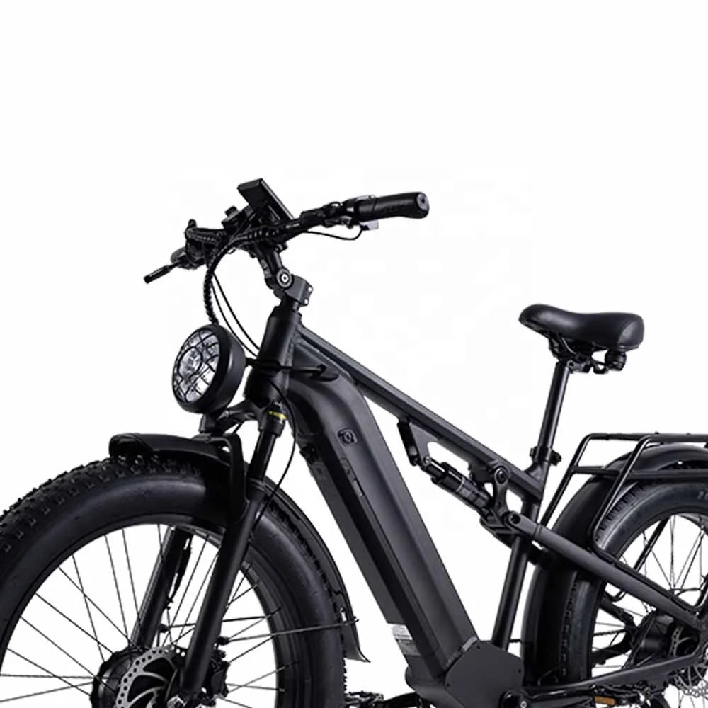 A matte black electric fat tire bicycle shown from a front three-quarter angle against a solid white background.