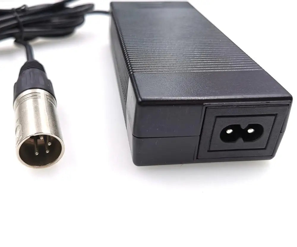 Black rectangular power adapter with a coiled cable and an XLR-style connector, photographed on a white background.