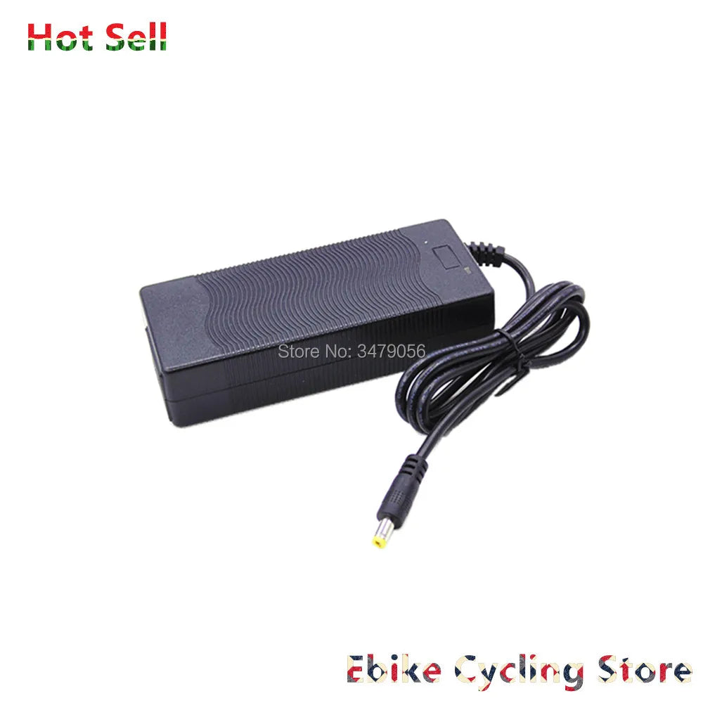 A black rectangular DC power adapter with a coiled cable and barrel connector, shown on a plain white background with store watermark text.