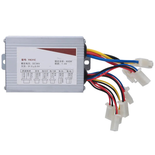 A silver metal electronic controller box with a white label, featuring multicolored wires (red, yellow, blue, black, white) and white connector plugs, shown on a plain white background.