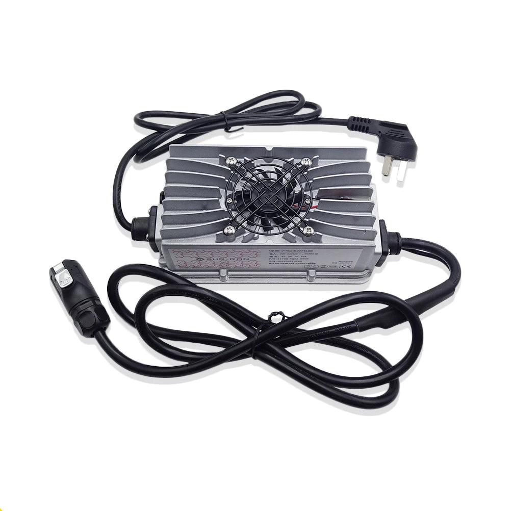 A silver and black electronic power supply unit with a cooling fan on top, connected to a black power cord with a two-prong plug and a cigarette lighter adapter, shown on a white background.