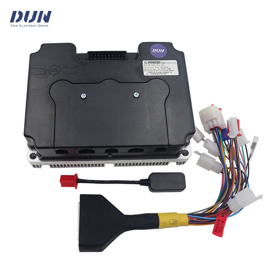 DUN electronic drive control module kit with a black main control box, multi-colored wiring harness connectors, a small black diagnostic tool, and a black connector probe, shown on a white background with the DUN brand logo in the top left corner.