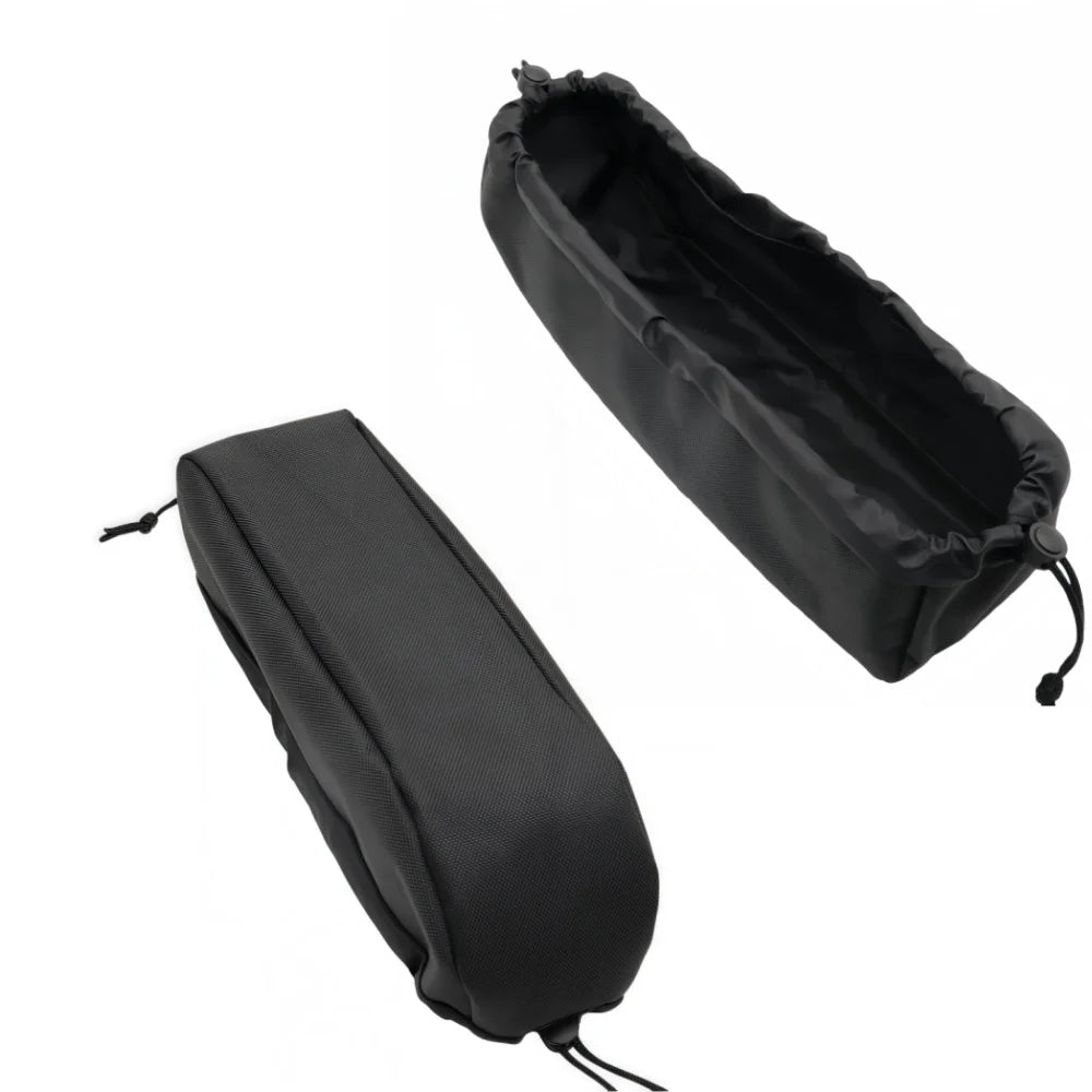 Two black drawstring storage pouches shown on a plain white background, one closed and one open to reveal the interior.