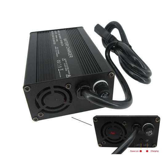 Black rectangular battery charger/power supply with a coiled black cable, shown on a white background with a smaller inset view of the rear dial panel and charging indicators.