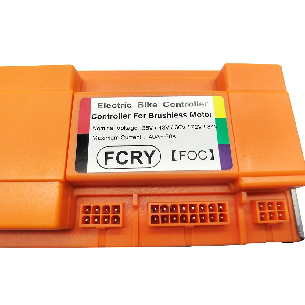 Orange electric bike controller with label on a white background