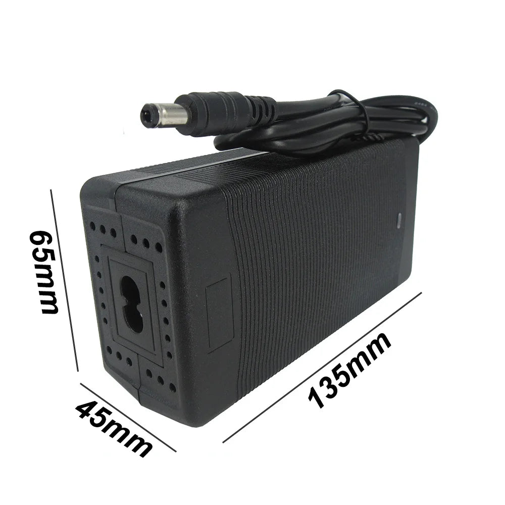 Black power adapter with dimensions labeled on a white background