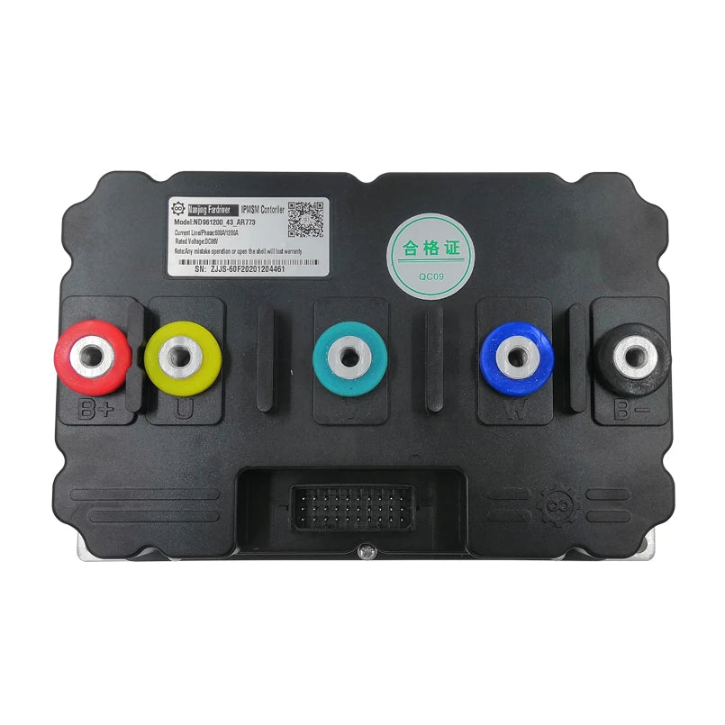 A black electronic control module with six colored terminal connectors (red, yellow, teal, blue, black, white) and a green certification sticker, photographed on a white background.