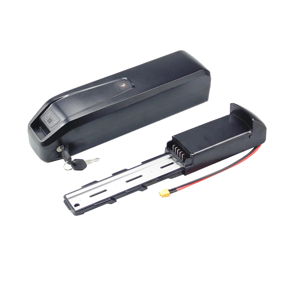 A black electric bicycle battery shown in two pieces on a white background, with one piece featuring a key on its lock and the other showing the internal terminal connections and a red wire connector.