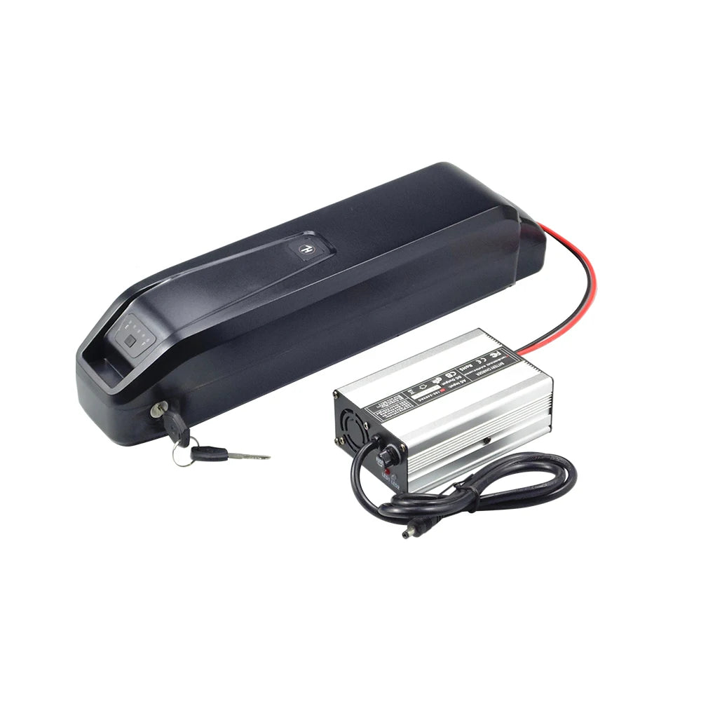 A black rectangular electric bicycle battery with a key attached, shown alongside a silver metal power adapter and black cable on a plain white background.