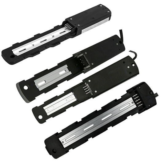 Four black and silver linear guide rails shown from different angles on a plain white background.