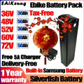 SAiKeung Ebike Battery Pack promotional graphic showing a tall black battery pack, a red decorative lantern, a charger, and large text listing voltages, capacities, 'Tax-Free', 'Free 5A Charger', 'Delivery-Free', '1 Year warranty', and 'Built-in Samsung Battery'.