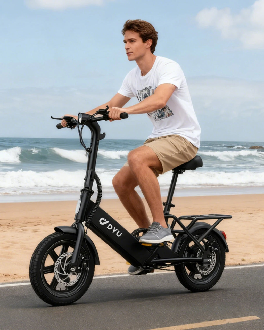 Person riding a black electric scooter with 'DYU' branding on a beach.