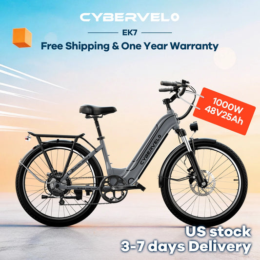 A gray Cybervelo EK7 electric bicycle shown in profile against a soft blue-to-beige gradient background with promotional text overlays including 'Free Shipping & One Year Warranty,' '1000W 48V25Ah,' and 'US stock 3-7 days Delivery.'.
