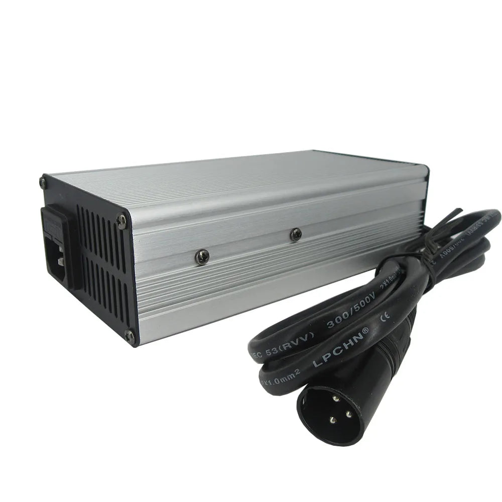 A silver aluminum power supply or inverter box with black side panels and ventilation slots, shown alongside black cables with XLR connectors on a plain white background.