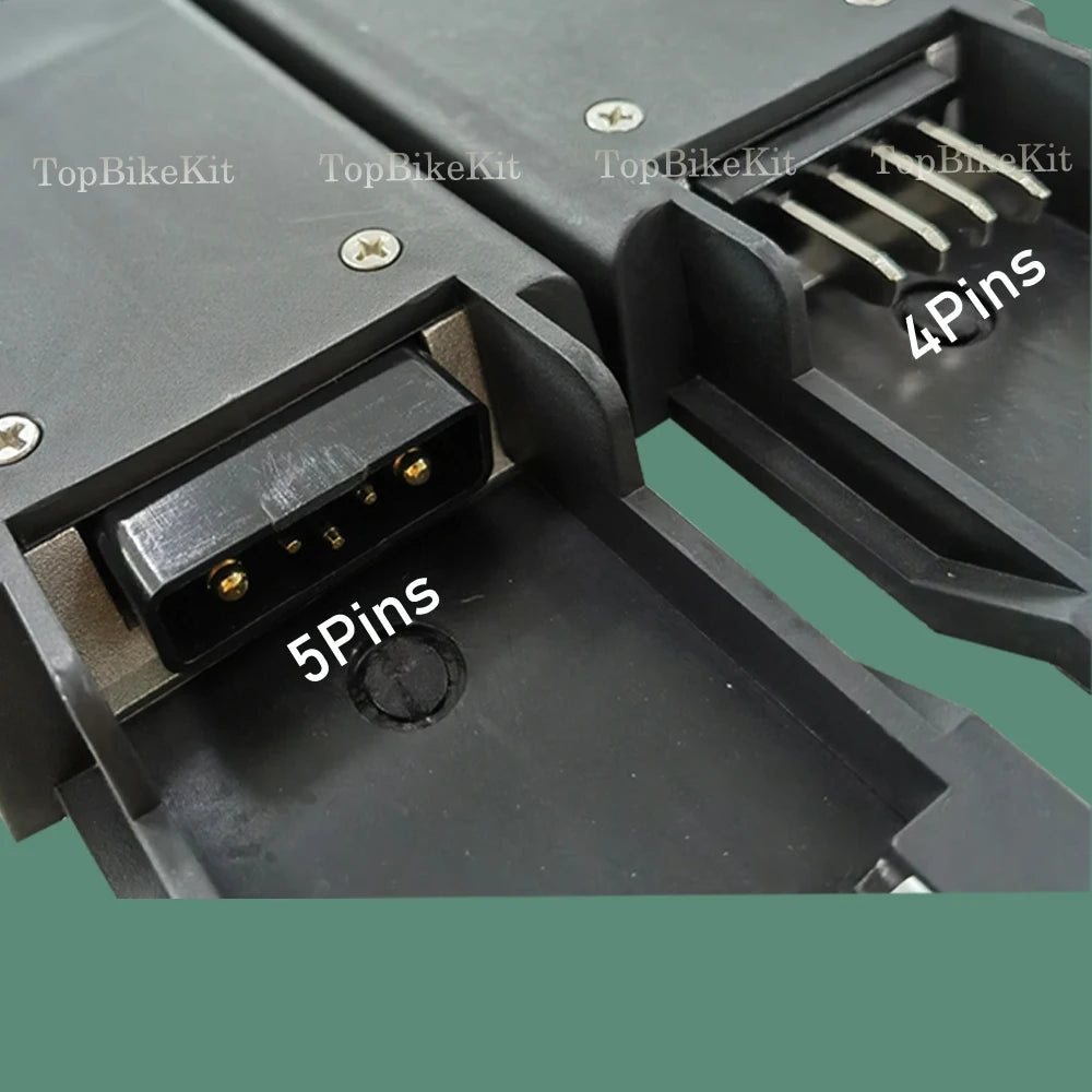 Close-up of a black electronic connector module with labeled pins, showing a 5-pin version and a 4-pin version, with 'TopBikeKit' watermarks across the image.