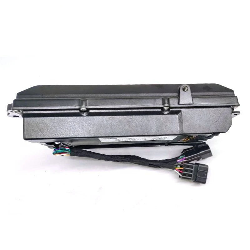 A black automotive electronic control module with attached wiring harnesses, photographed on a plain white background.