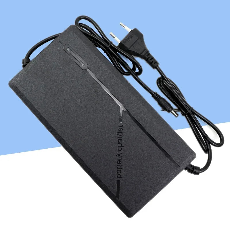Black power adapter with a cable on a blue and white gradient background