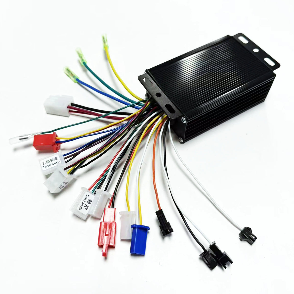 A black rectangular electronic control module with multiple colored wires and connectors, photographed on a plain white background.