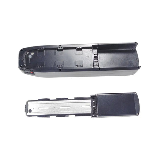 A replacement battery compartment cover and internal battery tray assembly, shown in two views against a plain white background.