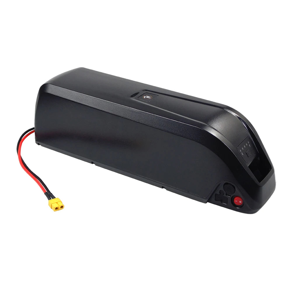 Black battery pack with connectors on a white background