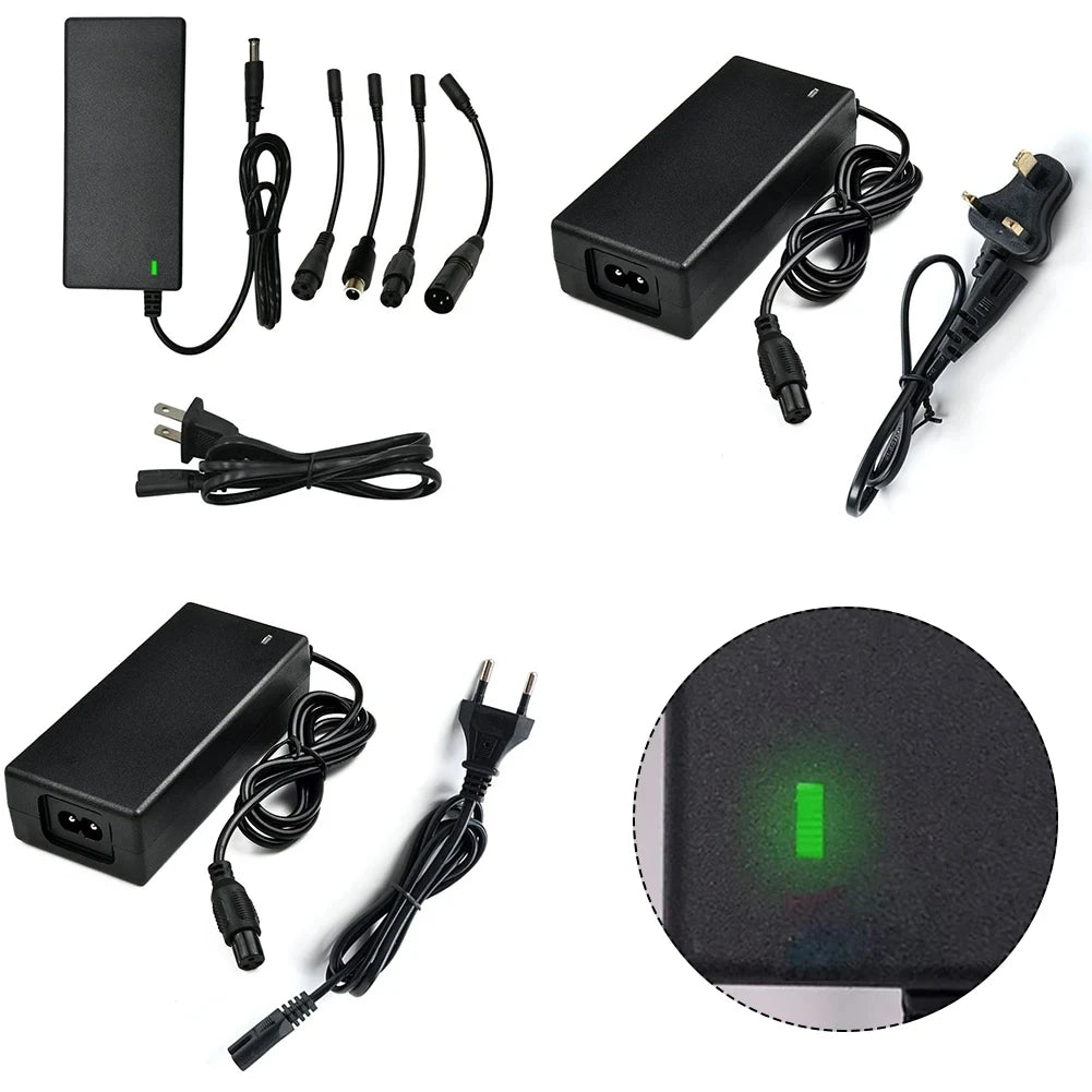 Collection of power adapters, cables, and a green light indicator on a white background