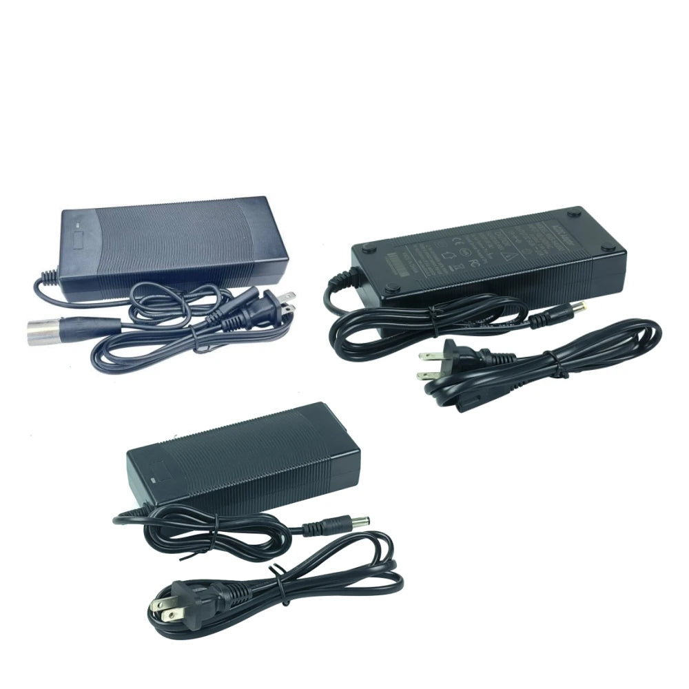 Three black power adapters with attached cables shown on a plain white background.