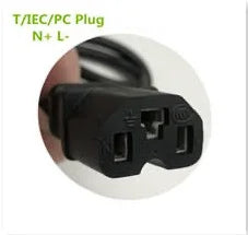 Black electrical plug on a white background