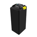 A tall, rectangular black battery pack with a top handle, a small digital display, and a yellow warning label, shown on a plain white background.